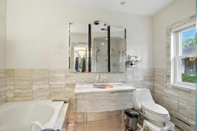 2516 Humboldt Ave S, Minneapolis, MN 55405 - full bathroom with a garden tub, tile walls, vanity, and a shower