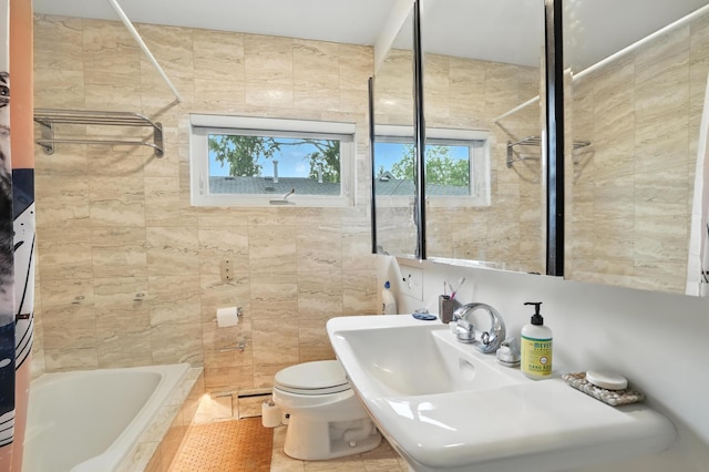 2516 Humboldt Ave S, Minneapolis, MN 55405 - full bath featuring tiled shower / bath combo, tile walls, and tile patterned flooring