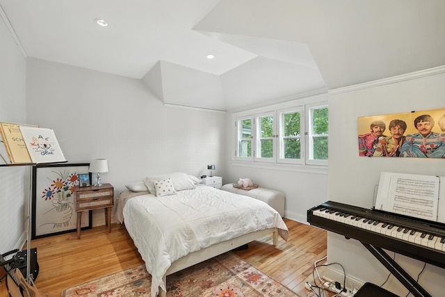2516 Humboldt Ave S, Minneapolis, MN 55405 - bedroom with light wood-style flooring and lofted ceiling