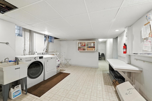 2516 Humboldt Ave S, Minneapolis, MN 55405 - laundry room featuring washing machine and dryer and recessed lighting