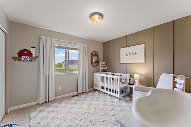809 Cologne Ln, Waverly, MN 55390 - bedroom featuring a crib and carpet floors