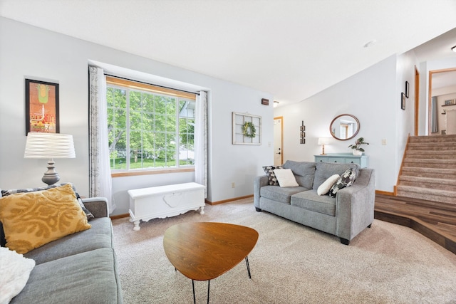 1590 Fountain Ln, Waconia, MN 55387 - living area featuring carpet floors, stairway, and vaulted ceiling