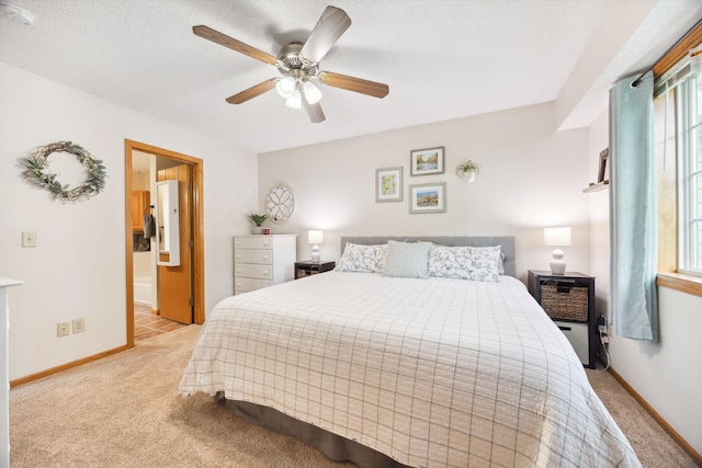 1590 Fountain Ln, Waconia, MN 55387 - bedroom featuring light colored carpet, a ceiling fan, ensuite bath, and a textured ceiling