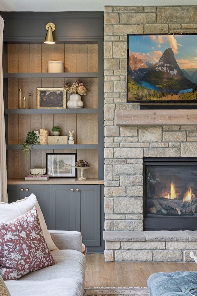 11278 Eastwood Ave SE, Delano, MN 55328 - living area with a fireplace and wood finished floors