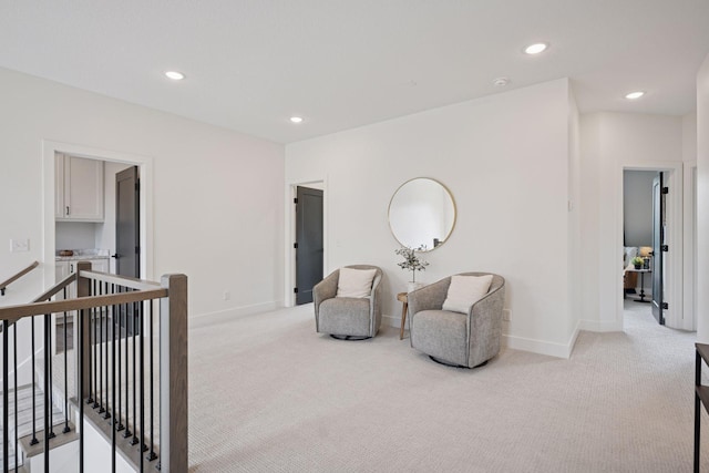 11278 Eastwood Ave SE, Delano, MN 55328 - sitting room with an upstairs landing, light carpet, and recessed lighting