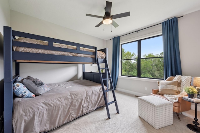 11278 Eastwood Ave SE, Delano, MN 55328 - carpeted bedroom with baseboards and a ceiling fan