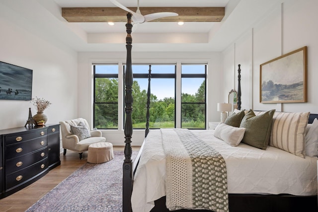 11278 Eastwood Ave SE, Delano, MN 55328 - bedroom featuring light wood finished floors and beamed ceiling