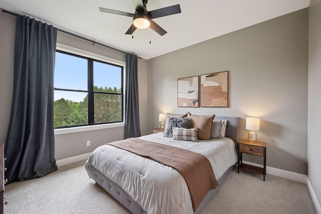 11278 Eastwood Ave SE, Delano, MN 55328 - carpeted bedroom with baseboards and a ceiling fan