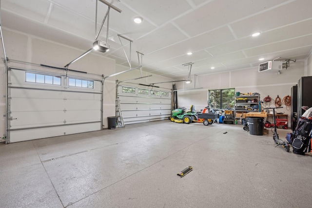 11278 Eastwood Ave SE, Delano, MN 55328 - garage featuring a garage door opener and recessed lighting