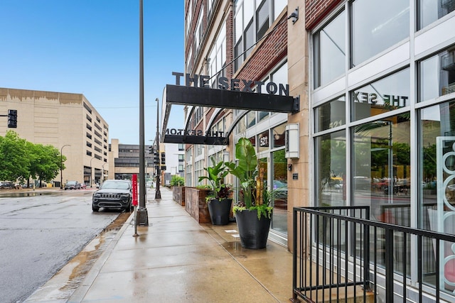 521 7th St Unit 416, Minneapolis, MN 55415 - view of asphalt road featuring sidewalks, curbs, and street lighting