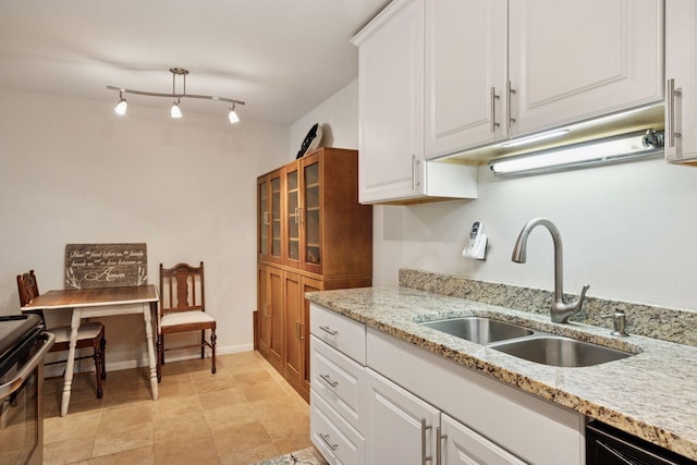 1901 Emerson Ave S Unit 104, Minneapolis, MN 55403 - kitchen featuring stainless steel range, white cabinets, light stone countertops, and dishwasher