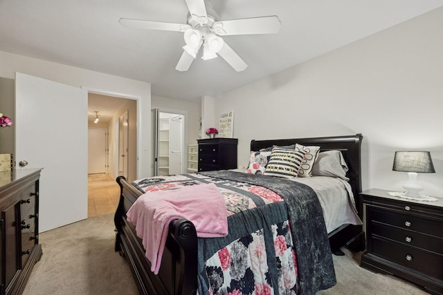 1901 Emerson Ave S Unit 104, Minneapolis, MN 55403 - bedroom with light colored carpet, ensuite bath, and ceiling fan