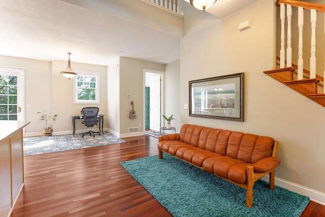 448 3rd St, Excelsior, MN 55331 - living area featuring wood finished floors, an office area, and stairway