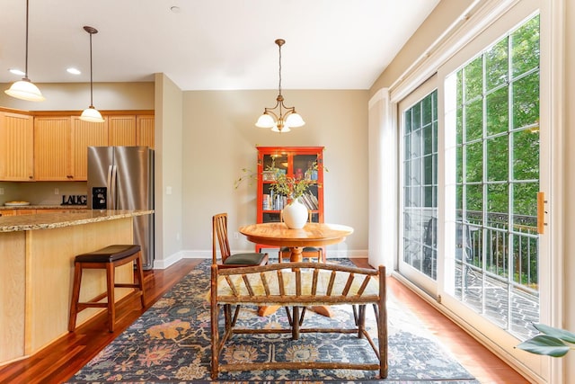 448 3rd St, Excelsior, MN 55331 - dining space featuring dark wood-style flooring, a chandelier, and recessed lighting