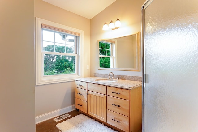 448 3rd St, Excelsior, MN 55331 - bathroom with vanity and baseboards