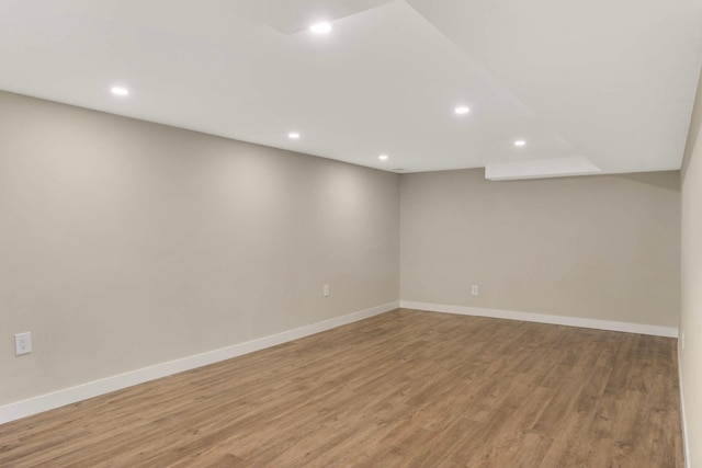 7609 65th Ave N, Brooklyn Park, MN 55428 - finished basement with recessed lighting, light wood-type flooring, and baseboards