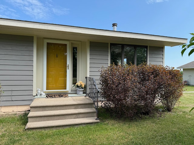 11391 Briski Rd, Balkan Twp, MN 55719 - doorway to property with a lawn