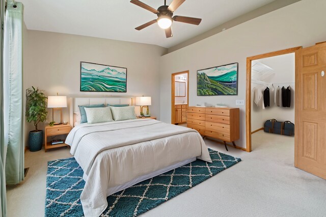 207 River Woods Dr W, Saint Paul Park, MN 55071 - carpeted bedroom featuring a spacious closet, ensuite bathroom, a closet, a ceiling fan, and baseboards