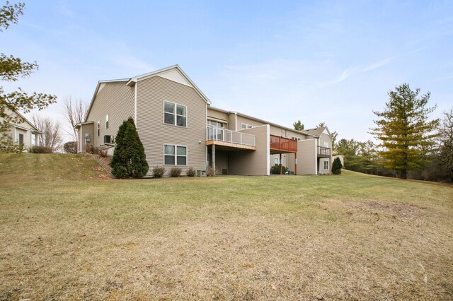 207 River Woods Dr W, Saint Paul Park, MN 55071 - rear view of house featuring a yard and a wooden deck