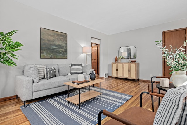 4618 Jefferson St NE, Columbia Heights, MN 55421 - living room featuring light wood-style floors and baseboards