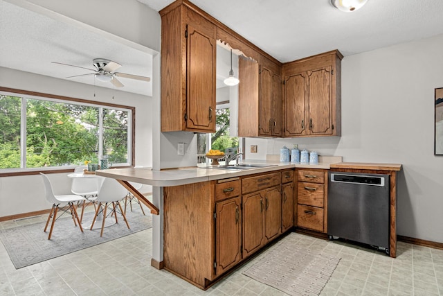 4618 Jefferson St NE, Columbia Heights, MN 55421 - kitchen with dishwasher, a sink, brown cabinetry, and ceiling fan