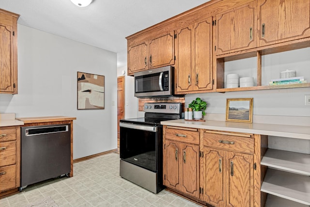 4618 Jefferson St NE, Columbia Heights, MN 55421 - kitchen featuring appliances with stainless steel finishes, open shelves, brown cabinetry, and light countertops