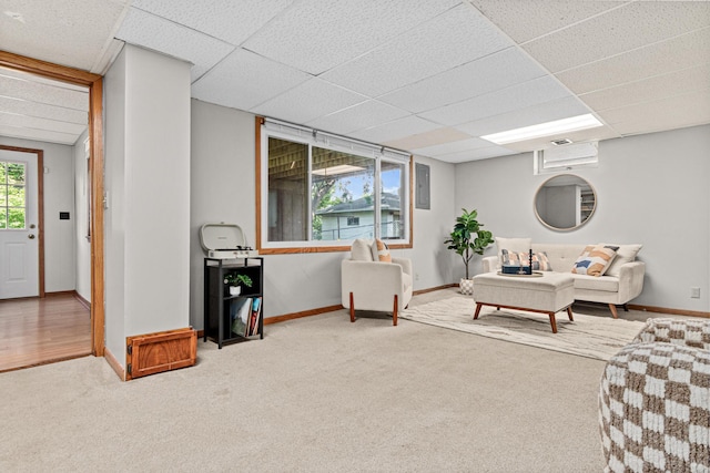 4618 Jefferson St NE, Columbia Heights, MN 55421 - carpeted living area featuring a paneled ceiling and baseboards