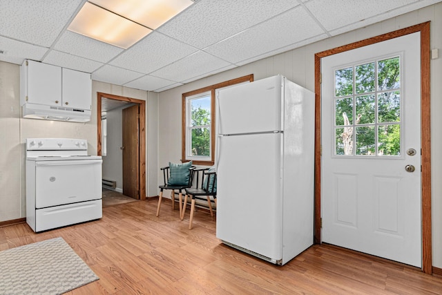 4618 Jefferson St NE, Columbia Heights, MN 55421 - kitchen with white appliances, under cabinet range hood, a paneled ceiling, white cabinetry, and light wood-type flooring