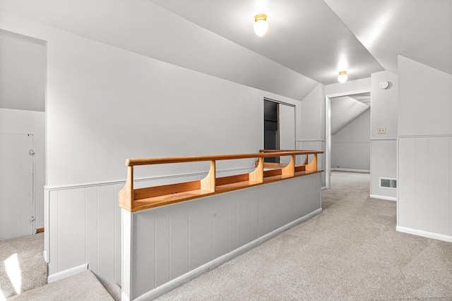 4618 Jefferson St NE, Columbia Heights, MN 55421 - bonus room featuring carpet flooring, vaulted ceiling, a decorative wall, and a wainscoted wall