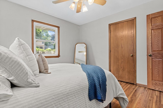 4618 Jefferson St NE, Columbia Heights, MN 55421 - bedroom with light wood-type flooring, ceiling fan, and baseboards