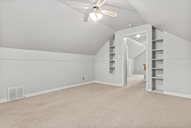 4618 Jefferson St NE, Columbia Heights, MN 55421 - additional living space with carpet flooring, vaulted ceiling, ceiling fan, and baseboards