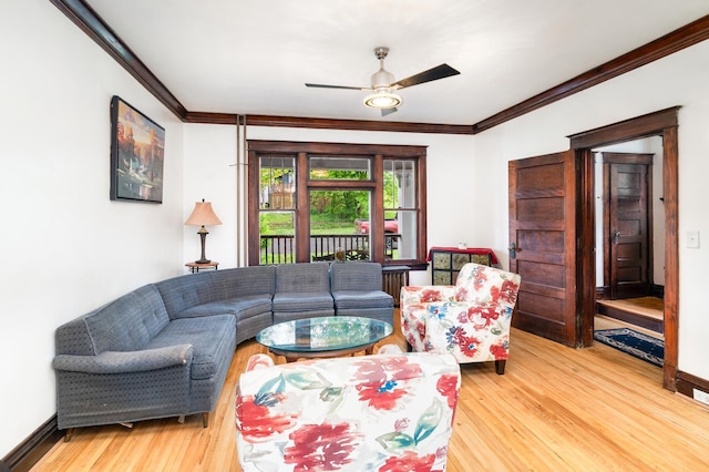 416 6th St, Duluth, MN 55805 - living room featuring ornamental molding, light wood-style flooring, ceiling fan, and baseboards