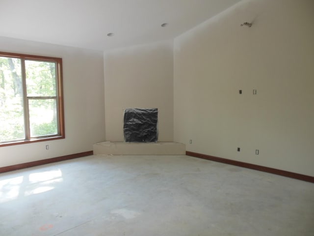 14502 Lynndale Dr, Baxter, MN 56425 - unfurnished living room with baseboards