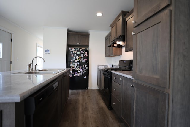 16962 Kenrick Ave Unit 7, Lakeville, MN 55044 - kitchen featuring black appliances, under cabinet range hood, a sink, dark wood-style floors, and a center island with sink