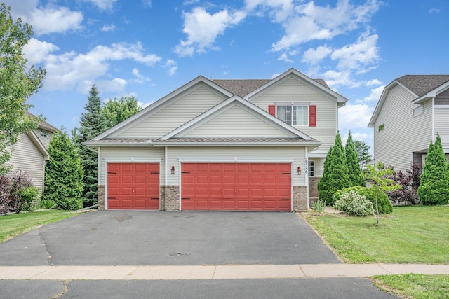 29259 Wildwood Rd, Chisago City, MN 55013 - view of front of home featuring driveway, a front yard, an attached garage, and a shingled roof
