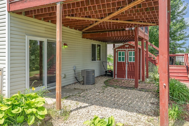 29259 Wildwood Rd, Chisago City, MN 55013 - view of patio / terrace featuring a storage shed and stairway