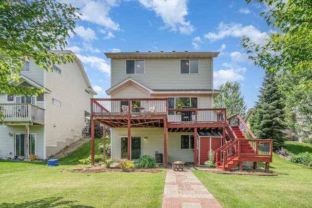 29259 Wildwood Rd, Chisago City, MN 55013 - back of house featuring a deck, a lawn, and stairway