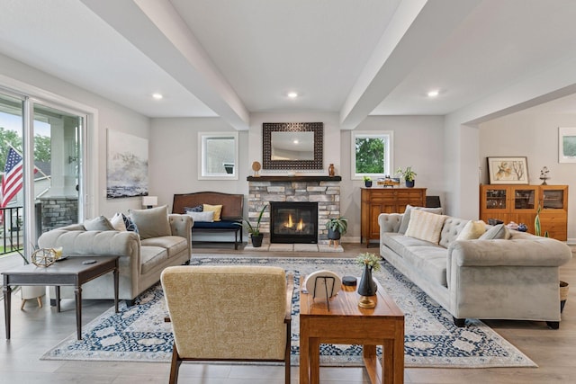 7465 Glengarry Pl, Eden Prairie, MN 55344 - living area with a fireplace, recessed lighting, light wood-style flooring, and beam ceiling
