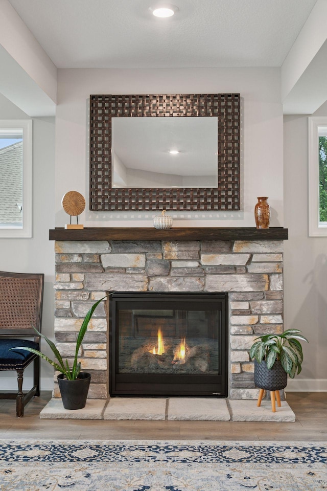 7465 Glengarry Pl, Eden Prairie, MN 55344 - detailed view of a fireplace and wood finished floors