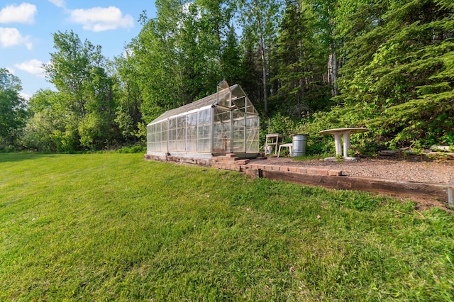 1928 Loop Rd, Two Harbors, MN 55616 - view of grassy yard with an exterior structure and an outbuilding