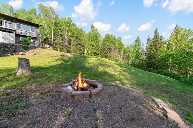 1928 Loop Rd, Two Harbors, MN 55616 - view of grassy yard featuring an outdoor fire pit
