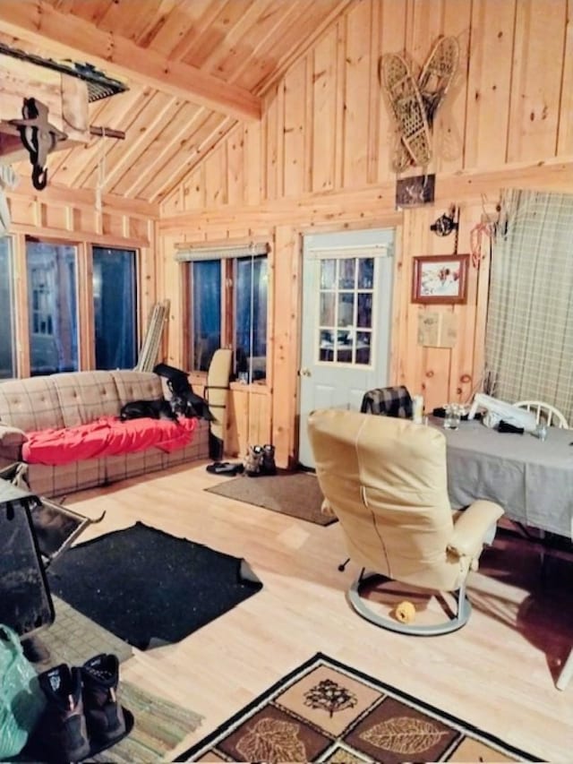 TBD Echo Trl, Greenwood Twp, MN 55771 - living area with wooden ceiling, wood finished floors, wood walls, and high vaulted ceiling