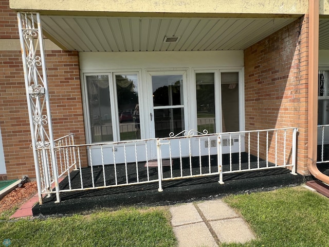 2711 12th St S Unit A2, Fargo, ND 58103 - doorway to property with brick siding