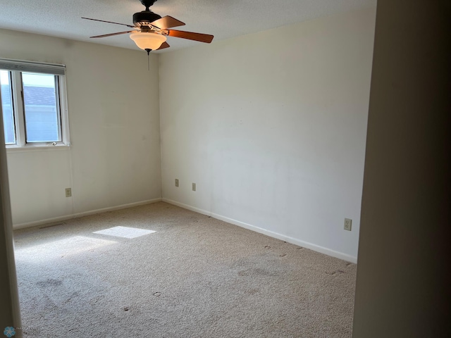 2711 12th St S Unit A2, Fargo, ND 58103 - carpeted spare room with ceiling fan and a textured ceiling
