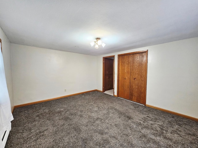 735 Main St N, Hutchinson, MN 55350 - unfurnished bedroom with carpet flooring and baseboards