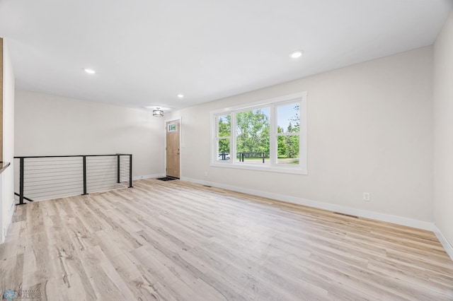 11763 230th St N, Keene Twp, MN 56549 - empty room with baseboards, wood finished floors, and recessed lighting