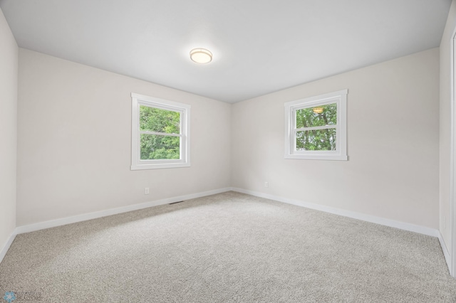 11763 230th St N, Keene Twp, MN 56549 - carpeted spare room featuring plenty of natural light and baseboards
