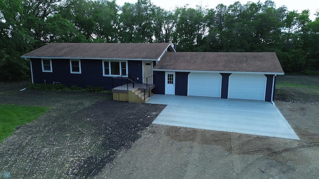 11763 230th St N, Keene Twp, MN 56549 - ranch-style home with a garage, driveway, and a shingled roof