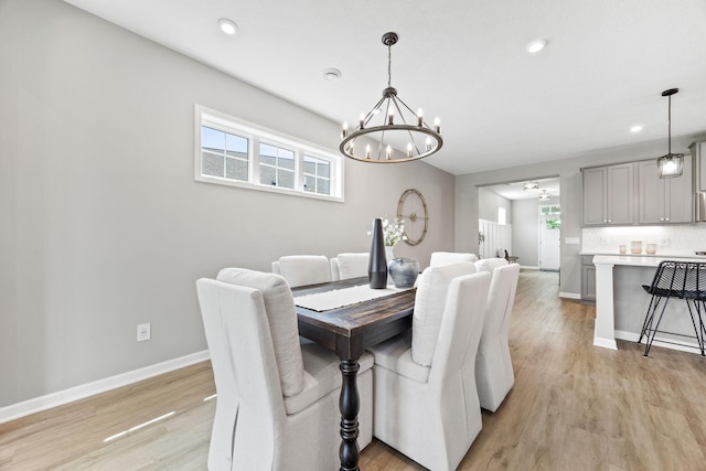 14645 Cloquet St, Dayton, MN 55327 - dining area featuring a chandelier, plenty of natural light, light wood finished floors, and recessed lighting