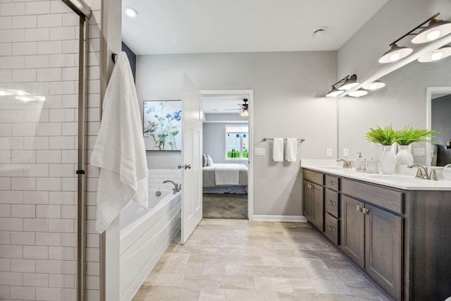 14645 Cloquet St, Dayton, MN 55327 - full bath featuring connected bathroom, double vanity, a bath, ceiling fan, and a tile shower